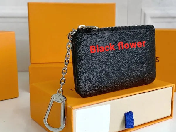 Womens card holder small zippy wallets key coin purse Brown flower M62650 poke keychain Genuine Leather luxury mens Designer wallet Coin Purses Key pouch CardHolder